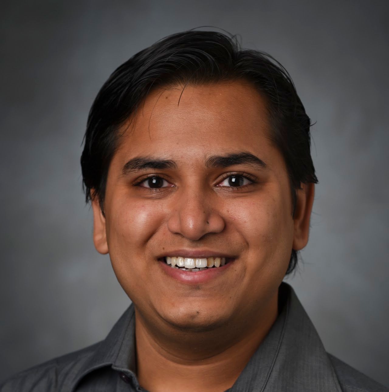 Cyan Subhra Mishra, head and shoulders portrait